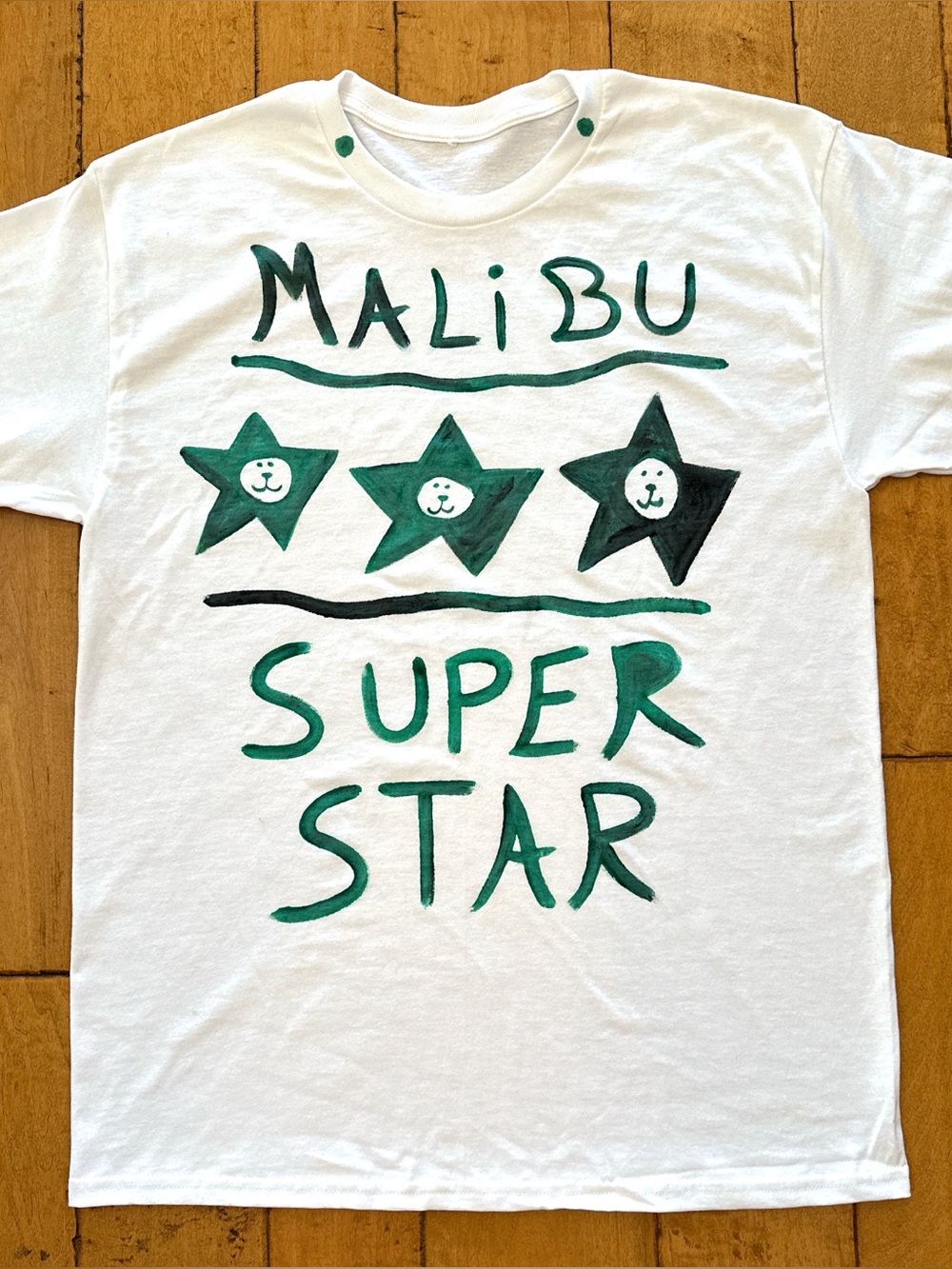 White T-Shirt with Green Star Graphic - Malibu Super Star